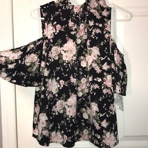 floral blouse.